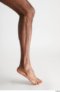 Tiago  1 calf flexing nude side view 0004.jpg